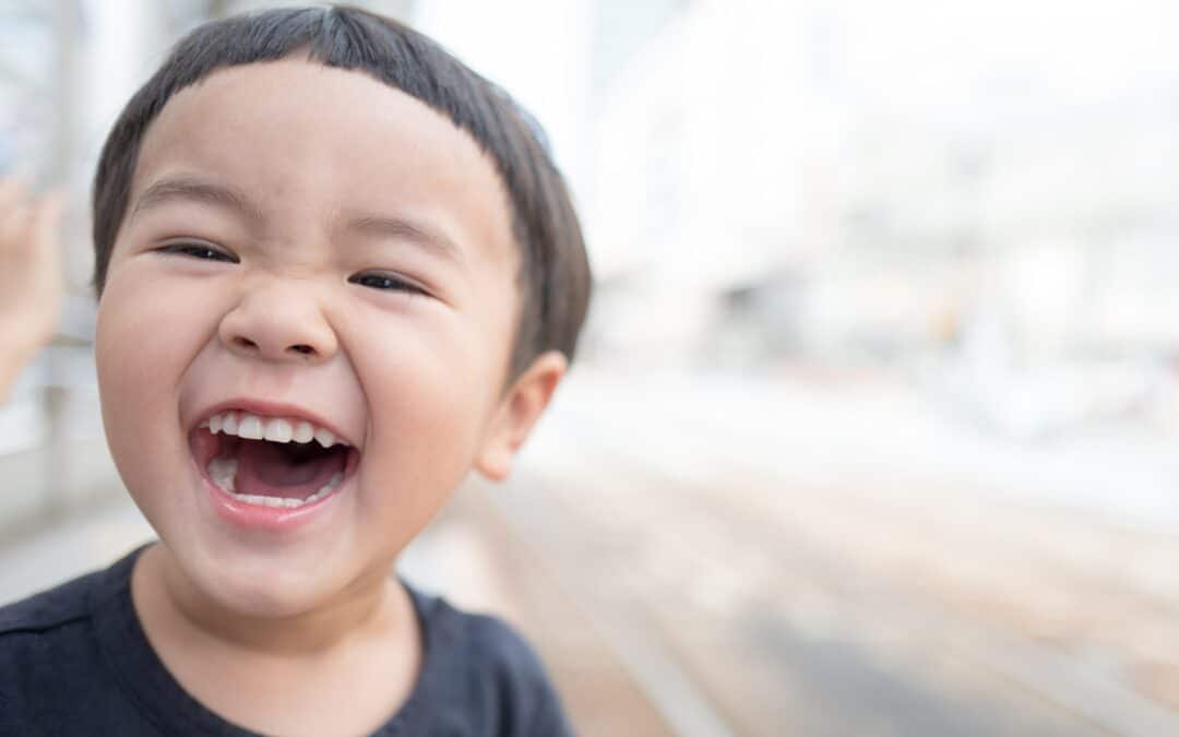 smiling boy When caring for your young child's dental health
